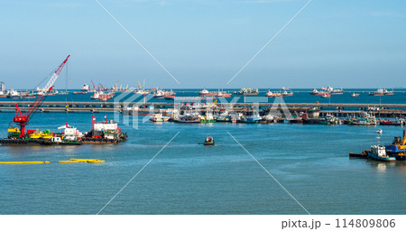 Logistic shipping quay boat Engineering crane depot at logistic export terminal control. Warehouse freight background container yard loading quayside harbor port. Logistics seascape shipping portal Logistic shipping quay boat Engineering crane depot at logistic export terminal control. Warehouse freight background container yard loading quayside harbor port. Logistics seascape shipping portal 114809806