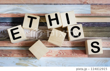 Ethics word written in a wooden cube on a vintage background 114812915