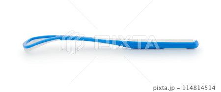 The tongue cleaner isolated on white. The tongue cleaner isolated on white. 114814514