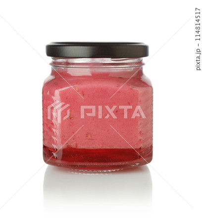 Berry dessert in a glass jar isolated. Berry dessert in a glass jar isolated. 114814517