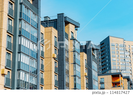 Modern residential architecture, blue sky background, new luxury condominiums. European city Modern residential architecture, blue sky background, new luxury condominiums. European city 114817427