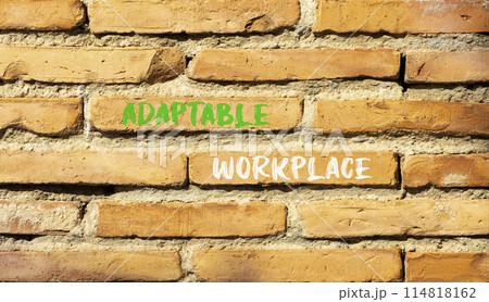 Adaptable workplace symbol. Concept words Adaptable workplace on beautiful brick wall. Beautiful red brown brick wall background. Business Adaptable workplace concept. Copy space. 114818162