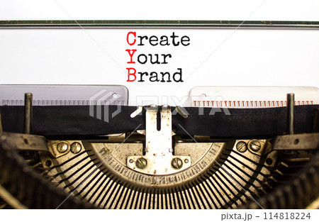 CYB Create your brand symbol. Concept words CYB Create your brand typed on beautiful old retro typewriter. Beautiful white background. Business CYB Create your brand concept. Copy space. 114818224
