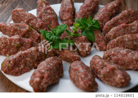RECIPE FOR LEBANESE KEBBE NAYYHE, RAW MINCED BEEF, MARJORAM, MINT, ONIONS, CRUSHED WHEAT, SEVEN RECIPE FOR LEBANESE KEBBE NAYYHE, RAW MINCED BEEF, MARJORAM, MINT, ONIONS, CRUSHED WHEAT, SEVEN 114818601