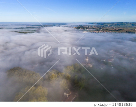 Aerial view of Bordeaux vineyard at sunrise spring under fog, Loupiac, Gironde, France Aerial view of Bordeaux vineyard at sunrise spring under fog, Loupiac, Gironde, France 114818639