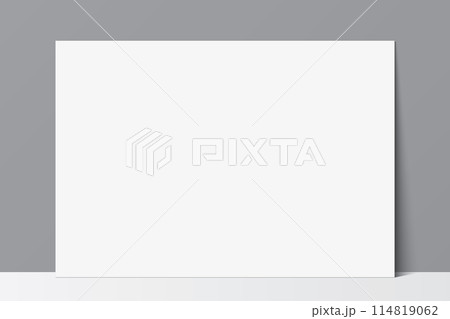 Blank white poster leaning against a grey wall background. Poster vector mockup. Blank white poster leaning against a grey wall background. Poster vector mockup. 114819062
