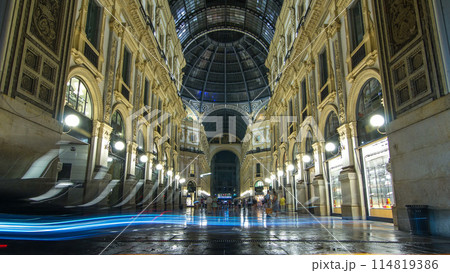 Entrance to the Galleria Vittorio Emanuele II timelapse from Via Tommaso Grossi at night. 114819386