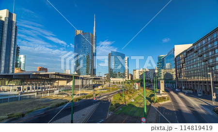 Milan skyline with modern skyscrapers in Porta Nuova business district timelapse hyperlapse in Milan, Italy, at sunset. Milan skyline with modern skyscrapers in Porta Nuova business district timelapse hyperlapse in Milan, Italy, at sunset. 114819419