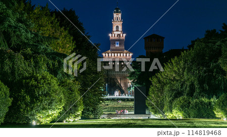 Night view of the Parco Sempione large central park timelapse in Milan, Italy. The Sforza Castle in the background. Night view of the Parco Sempione large central park timelapse in Milan, Italy. The Sforza Castle in the background. 114819468