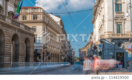Traffic on Alessandro Manzoni street near main concert hall of Teatro alla Scala, an opera house timelapse in Milan, Italy. Traffic on Alessandro Manzoni street near main concert hall of Teatro alla Scala, an opera house timelapse in Milan, Italy. 114819500