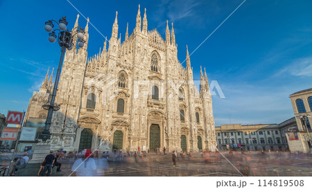 The Duomo cathedral timelapse hyperlapse at sunset. Front view with people walking on square 114819508