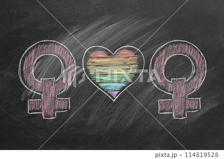Two female gender symbols on blackboard Two female gender symbols on blackboard 114819528
