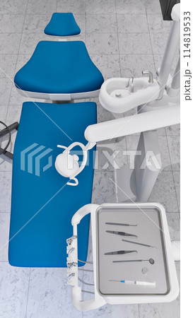 Top view of empty dentist workplace - dental unit, comfortable chair and tools in bright medical clinic office interior. Dentistry surgery room with modern equipment 3D illustration from my rendering. Top view of empty dentist workplace - dental unit, comfortable chair and tools in bright medical clinic office interior. Dentistry surgery room with modern equipment 3D illustration from my rendering. 114819533