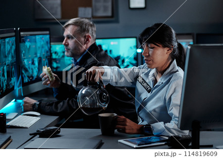 Security guards having coffee break Security guards having coffee break 114819609