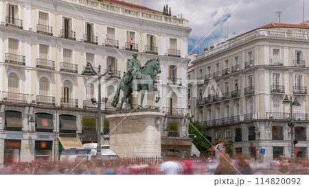 Statue of Charles III one of the famouse King of Spain timelapse hyperlapse on Puerta del Sol square in Madrid, Spain 114820092
