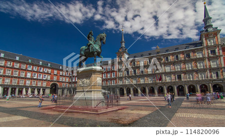 Statue of Philip III timelapse hyperlapse at Mayor plaza in Madrid in a beautiful summer day, Spain Statue of Philip III timelapse hyperlapse at Mayor plaza in Madrid in a beautiful summer day, Spain 114820096
