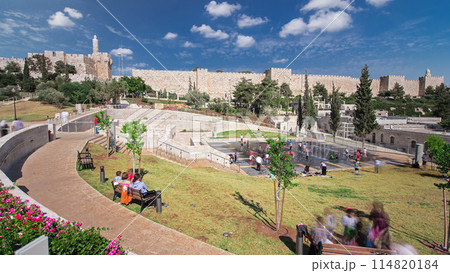 New urban Teddy Park and Tower of David on background under blue sky timelapse hyperlapse in Jerusalem, Israel. 114820184