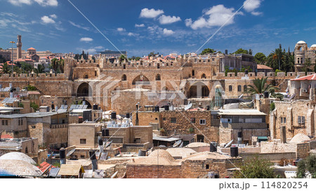 Skyline of the Old City in Jerusalem with historic buildings aerial timelapse, Israel. Skyline of the Old City in Jerusalem with historic buildings aerial timelapse, Israel. 114820254