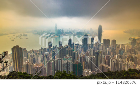 The famous view of Hong Kong from Victoria Peak timelapse. Sunrise with colorful clouds over Kowloon Bay. 114820376