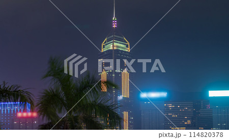 Close up view of the futuristic skyscrapers timelapse and their blinking lights on Kowloon 114820378