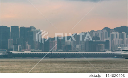 Hong Kong skyline in the morning over Victoria Harbour timelapse. 114820408