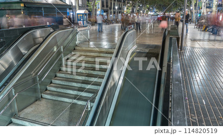 Exit from metro to La Rambla street in Barcelona night timelapse, Spain. Exit from metro to La Rambla street in Barcelona night timelapse, Spain. 114820519