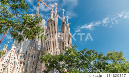Sagrada Familia, a large Roman Catholic church in Barcelona, Spain timelapse 114820527