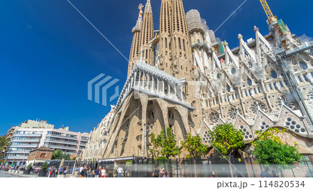 Sagrada Familia, a large Roman Catholic church in Barcelona, Spain timelapse hyperlapse 114820534