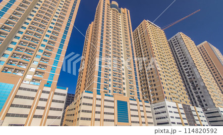 Modern new towers in Ajman timelapse hyperlapse. Cityscape of Ajman. Modern new towers in Ajman timelapse hyperlapse. Cityscape of Ajman. 114820592