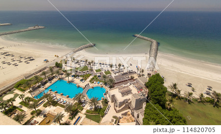 Beautiful area of beach in Ajman timelapse near the turquoise waters of Arabian Gulf. Beautiful area of beach in Ajman timelapse near the turquoise waters of Arabian Gulf. 114820705