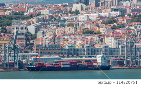 Panorama of Lisbon historical centre aerial timelapse viewed from above the southern margin of the Tagus or Tejo River. 114820751