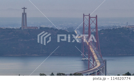 Panoramic overview during sunrise over Lisbon and Almada from a viewpoint in Monsanto morning timelapse. 114820774