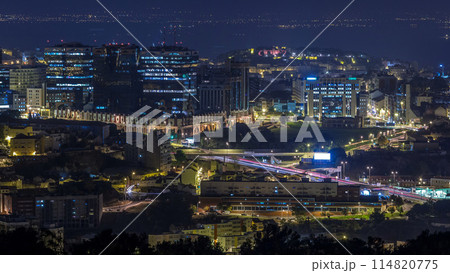 Panoramic view over Lisbon and Almada from a viewpoint in Monsanto night to day timelapse. Panoramic view over Lisbon and Almada from a viewpoint in Monsanto night to day timelapse. 114820775