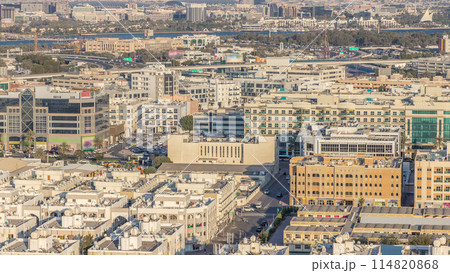 Aerial view of neighborhood Deira with typical buildings timelapse, Dubai, United Arab Emirates Aerial view of neighborhood Deira with typical buildings timelapse, Dubai, United Arab Emirates 114820868
