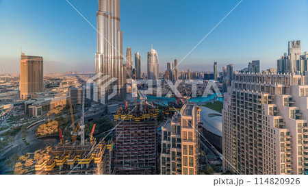 Panoramic skyline view of Dubai downtown with mall, fountains and skyscrapers aerial timelapse 114820926
