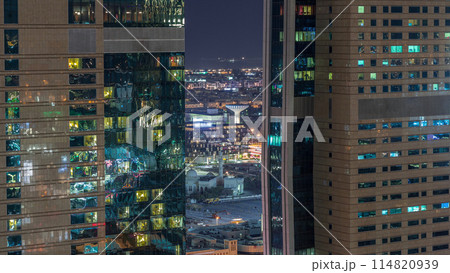 Amazing aerial view of Dubai downtown skyscrapers night timelapse, Dubai, United Arab Emirates Amazing aerial view of Dubai downtown skyscrapers night timelapse, Dubai, United Arab Emirates 114820939