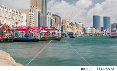 A water taxi boat station in Deira timelapse. 114820978