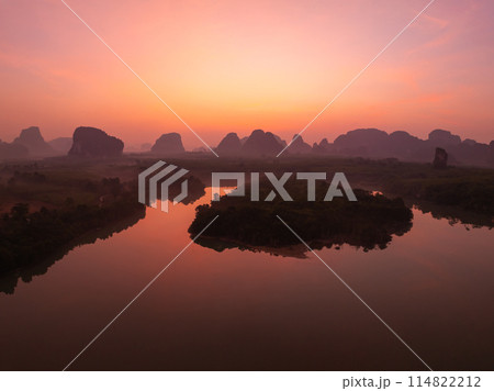 Sunset or sunrise light over lake or pond,Amazing landscape colorful sky background Sunset or sunrise light over lake or pond,Amazing landscape colorful sky background 114822212