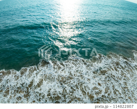 Sea surface aerial view,Bird eye view photo of blue waves and water surface texture, Blue sea background, Beautiful nature, Amazing view sea background Sea surface aerial view,Bird eye view photo of blue waves and water surface texture, Blue sea background, Beautiful nature, Amazing view sea background 114822807