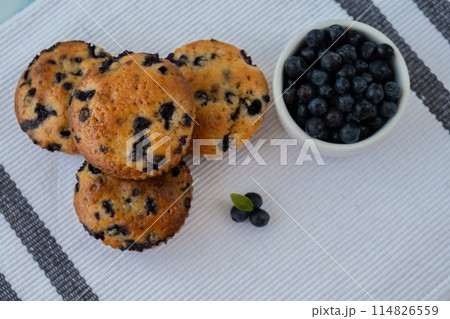 Homemade baked blueberry muffins with fresh blackberries. Tasty pastry sweet cupcake dessert. Berry pie cupcakes with organic berries. Gluten free healthcare recipe from alternative flour Homemade baked blueberry muffins with fresh blackberries. Tasty pastry sweet cupcake dessert. Berry pie cupcakes with organic berries. Gluten free healthcare recipe from alternative flour 114826559