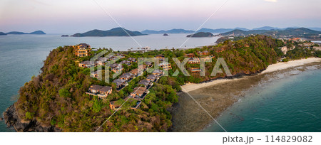 View of resort in Panwa beach at sunset, in Phuket, Thailand View of resort in Panwa beach at sunset, in Phuket, Thailand 114829082