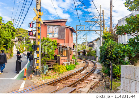 Kamakura's famous cafe next to the train tracks, sit or stand and eat food or drink and watch the trains pass by up close Japan Kamakura's famous cafe next to the train tracks, sit or stand and eat food or drink and watch the trains pass by up close Japan 114831344