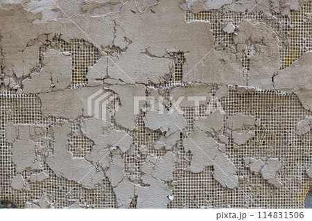 cheap plaster peeled off, revealing mesh layer cheap plaster peeled off, revealing mesh layer 114831506