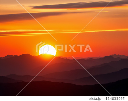 sunset over mountains 114833965
