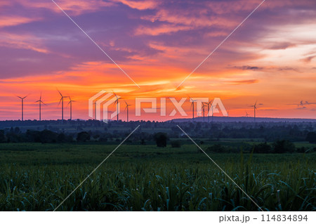 Landscape Windmill on a mountain with vast meadows at sunset, beautifully illuminated. 114834894