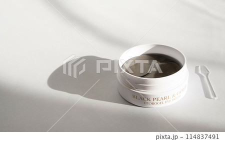 Package with collagen eye patches on white background. Korean hydrogel eye patch 114837491