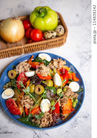 nicoise salad with tuna on the table with vegetables top view nicoise salad with tuna on the table with vegetables top view 114838142