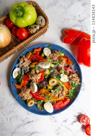 nicoise salad with tuna on the table with vegetables top view nicoise salad with tuna on the table with vegetables top view 114838143