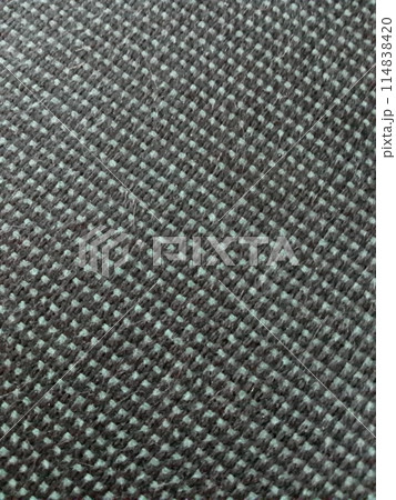 Black and Green Uniform Woven Fabric Surface. 114838420