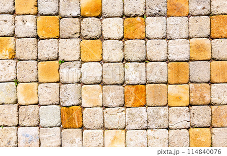 Square shaped paving slabs as a creative background, stone texture Square shaped paving slabs as a creative background, stone texture 114840076